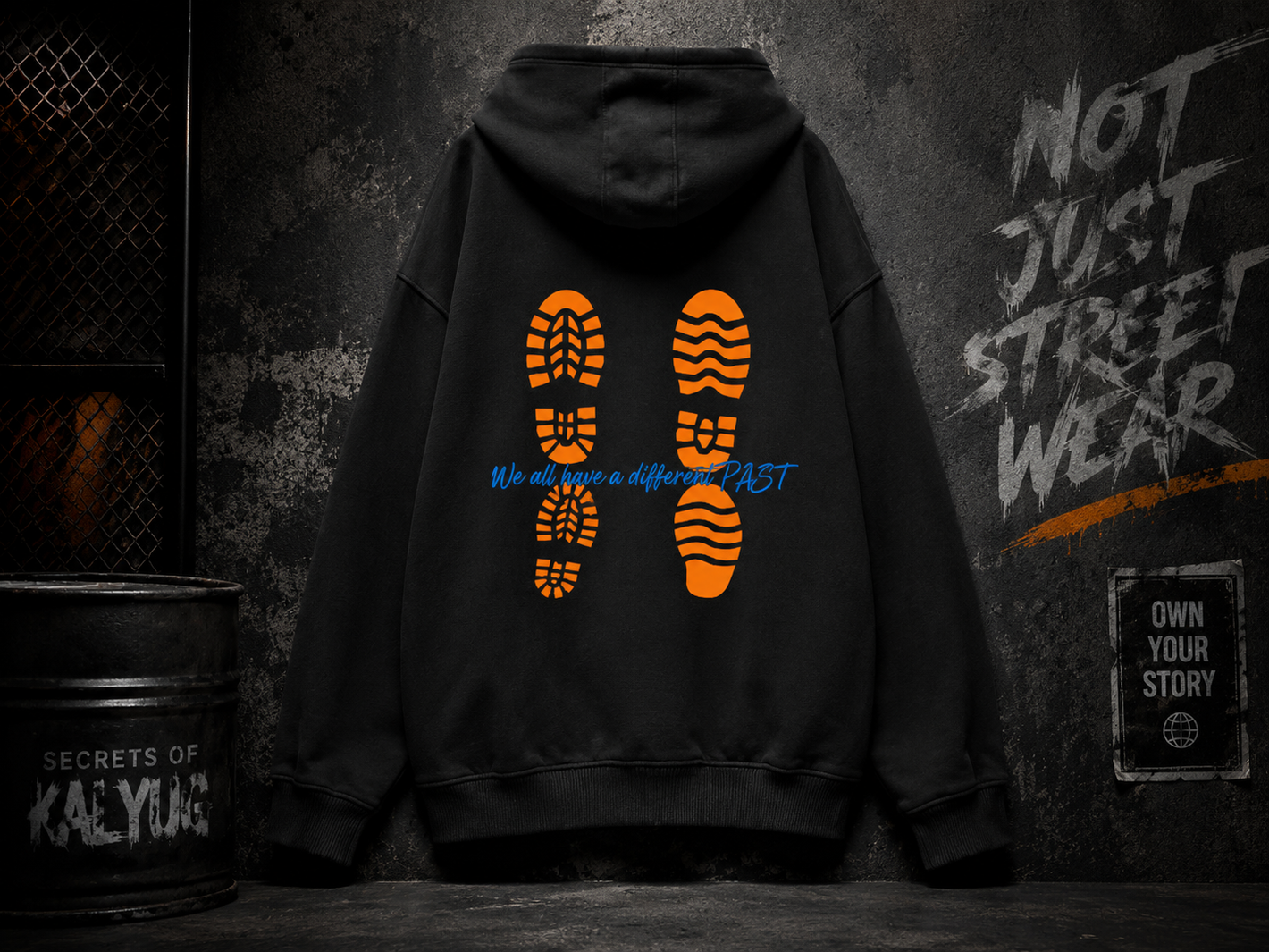 Black oversized hoodie with “Don’t Judge Me – You Never Walked In My Shoes” graphic print in a dark premium streetwear fashion mockup for Secrets of Kalyug India